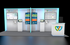 10' x 20' Scalable Custom Exhibit w/ Edge Lighting, Presentation Areas and Interactive Kiosks (ID0617)